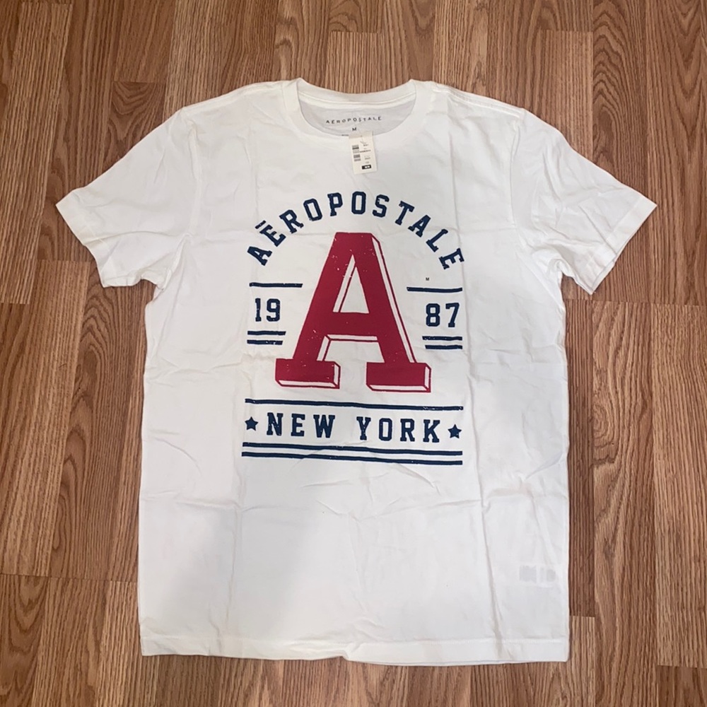 Men T-Shirt. White. Size: Medium. Never worn!